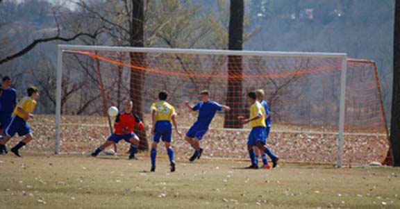 picture kids playing soccer