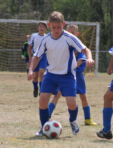 image of 2 players on open soccer field