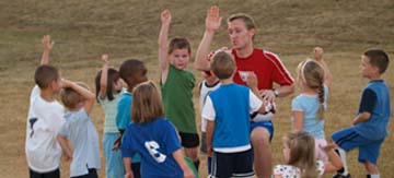 picture kids playing soccer